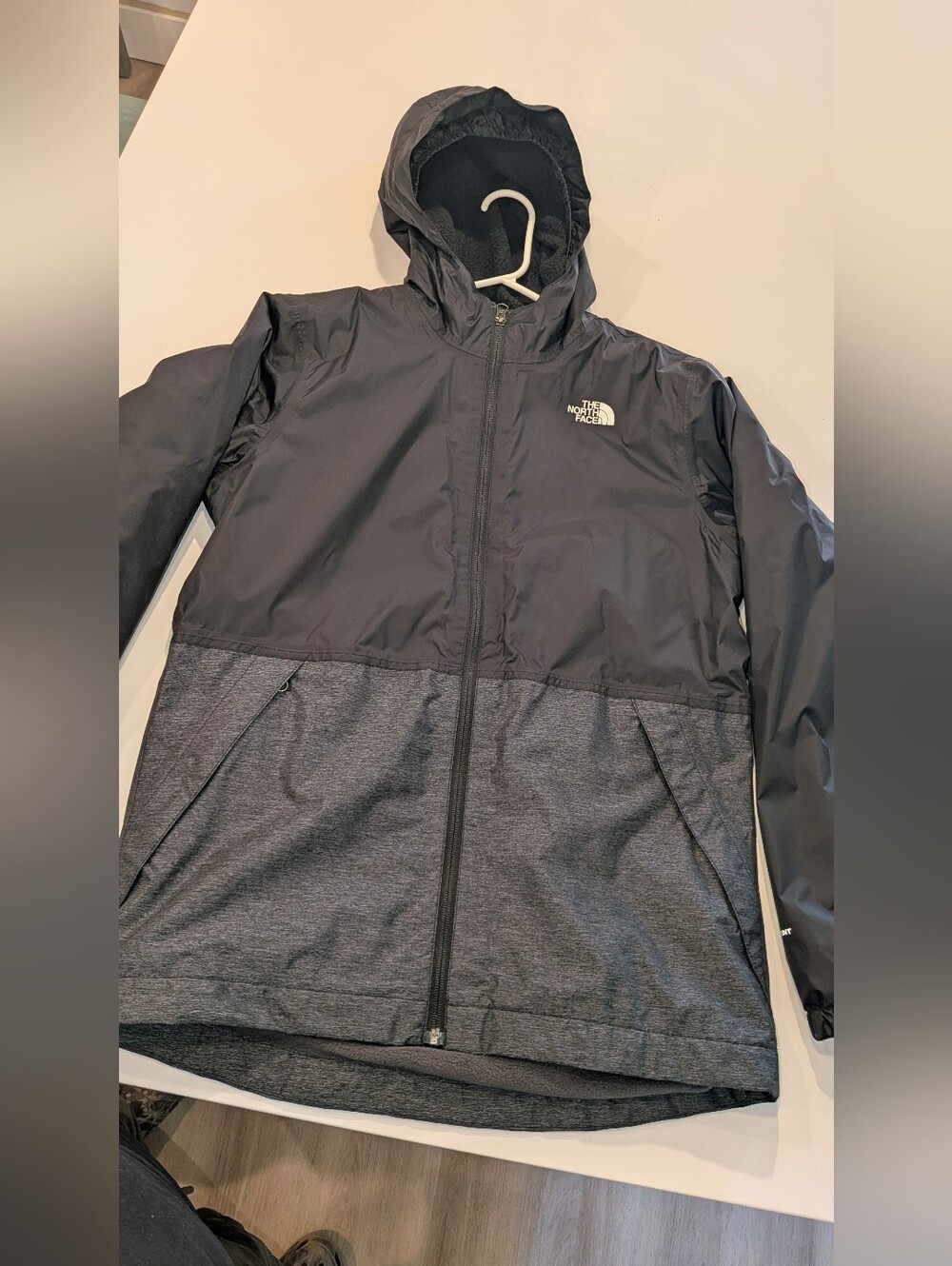 Boys The North Face Black and Gray Hooded Lined Windbreaker Jacket.